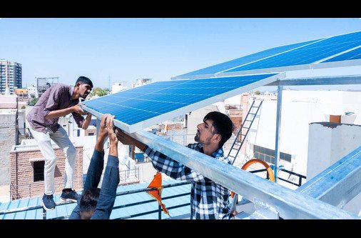stock photo solar cells have been maintained and maintenance by a team of engineers two engineers checking 2136341155 1 8 1